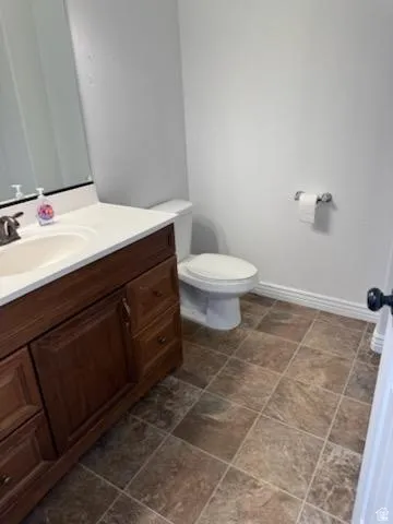 Bathroom with vanity and toilet