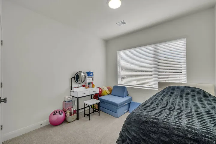 Bedroom featuring carpet flooring