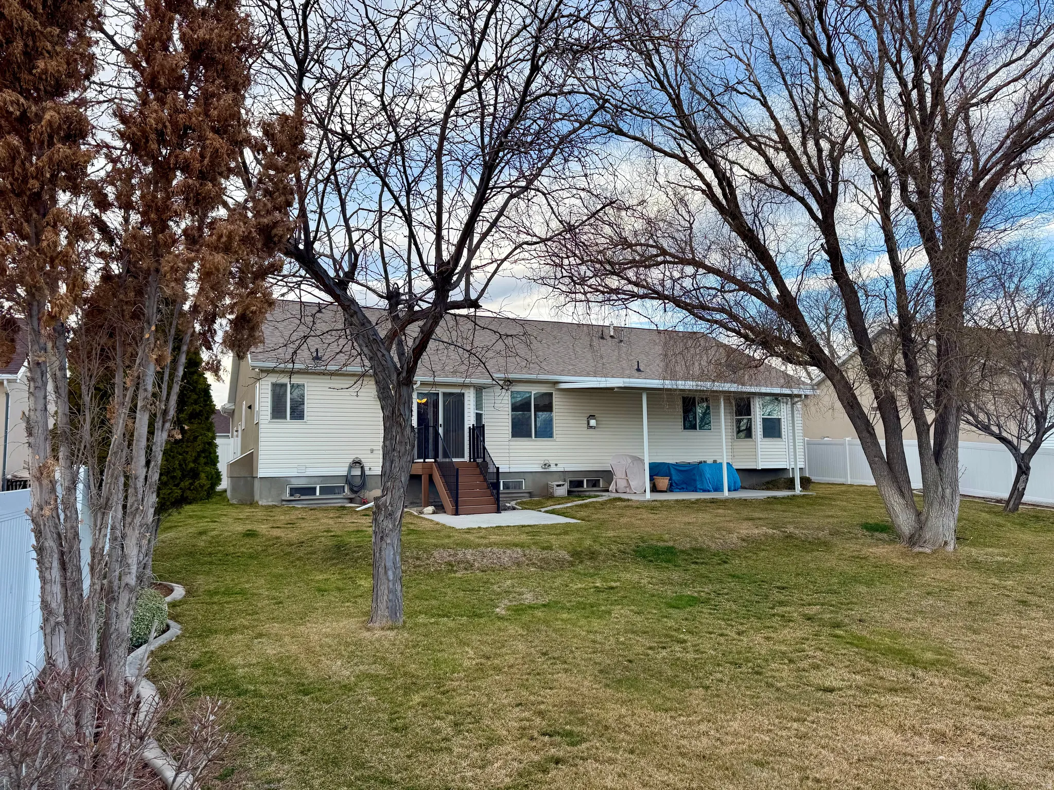 Rear view of property with a patio