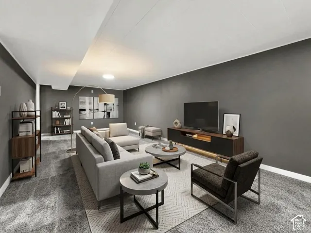 Recessed lighting, wood-finish shelving, wall-mounted television console, and grey carpeting