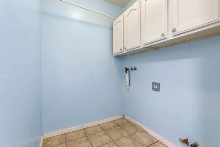 Laundry room with cabinet space and washer hookup