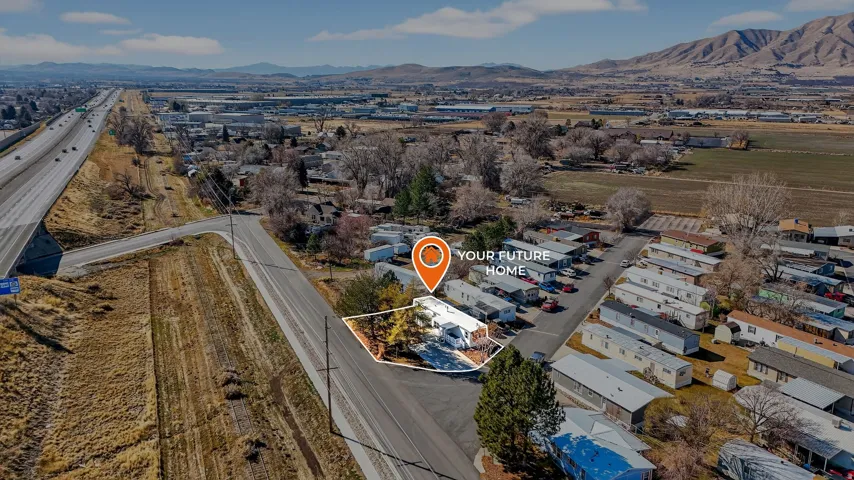 Aerial view of residential area with a mountainous background