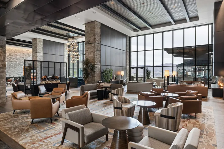Building lobby with a high ceiling and expansive windows