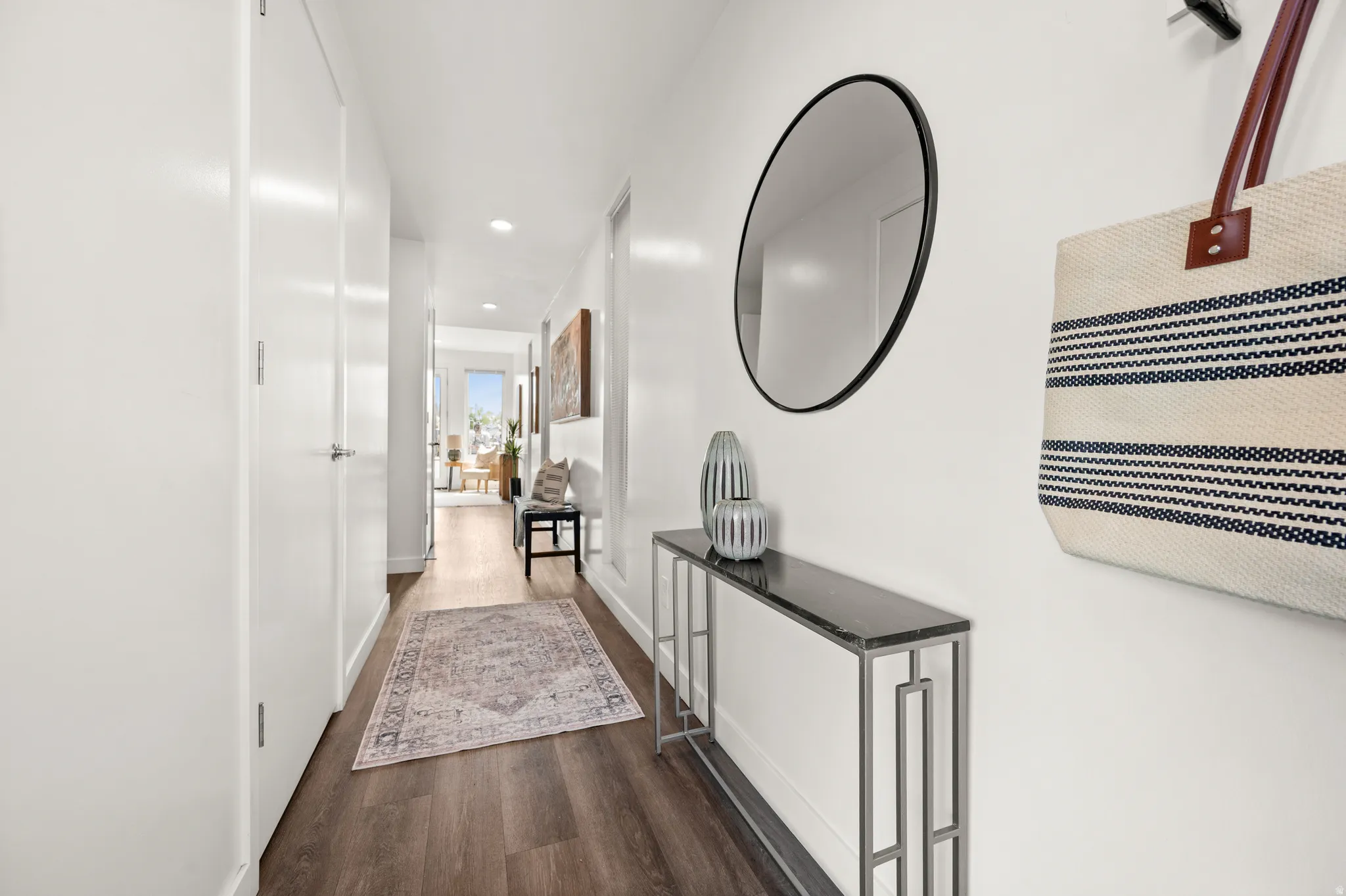 Corridor with recessed lighting and dark wood-style floors