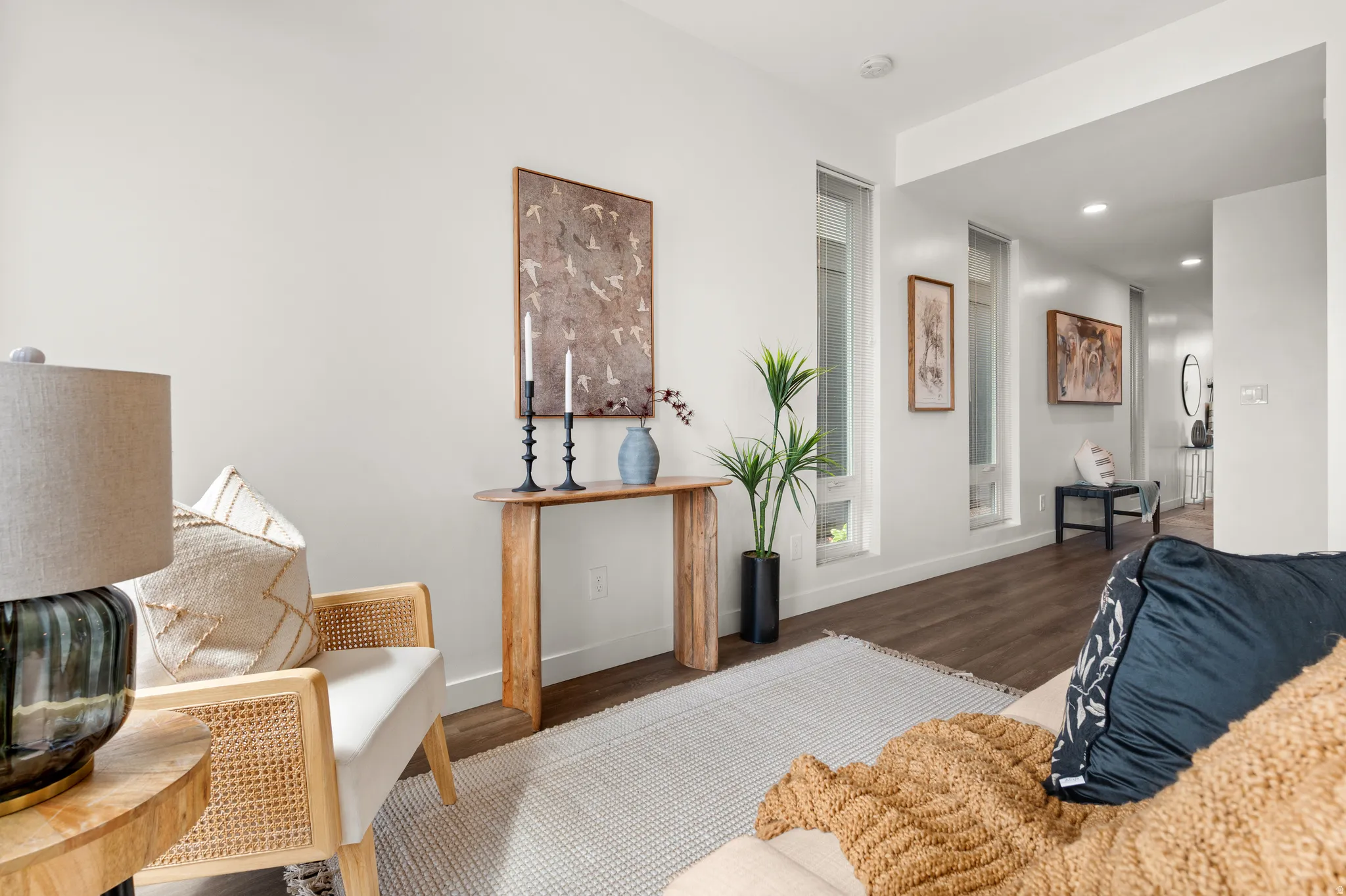 Living room with recessed lighting and wood finished floors