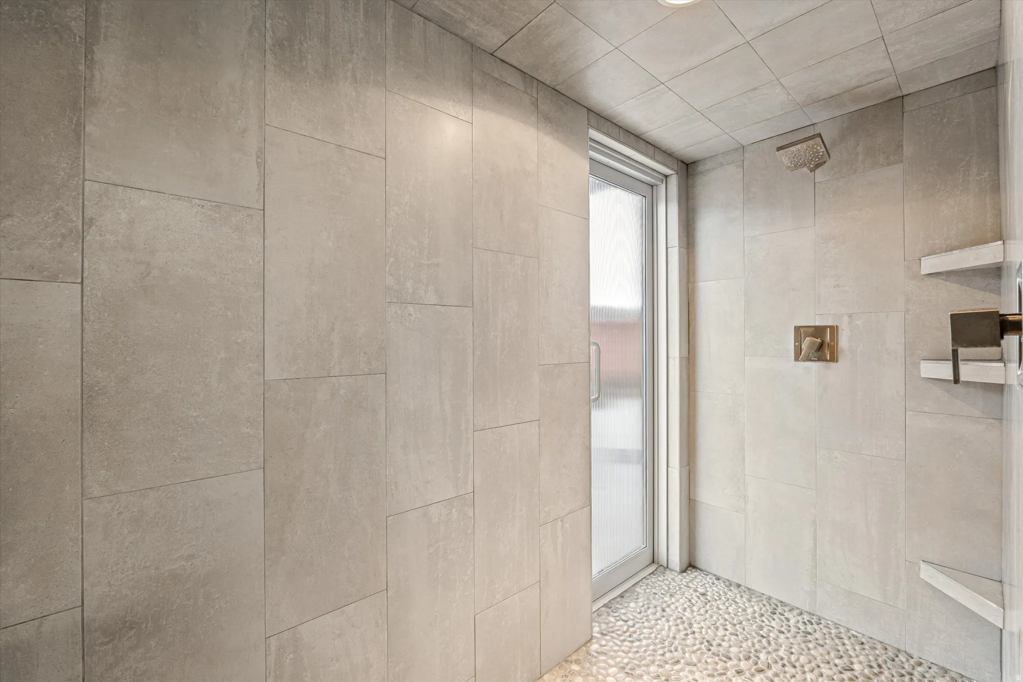 Bathroom with a tile shower