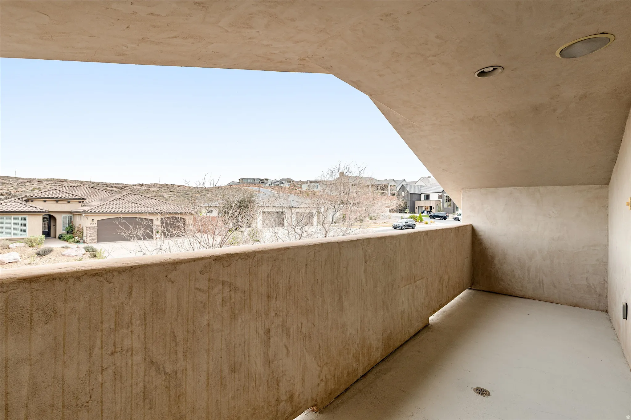 Balcony featuring a residential view