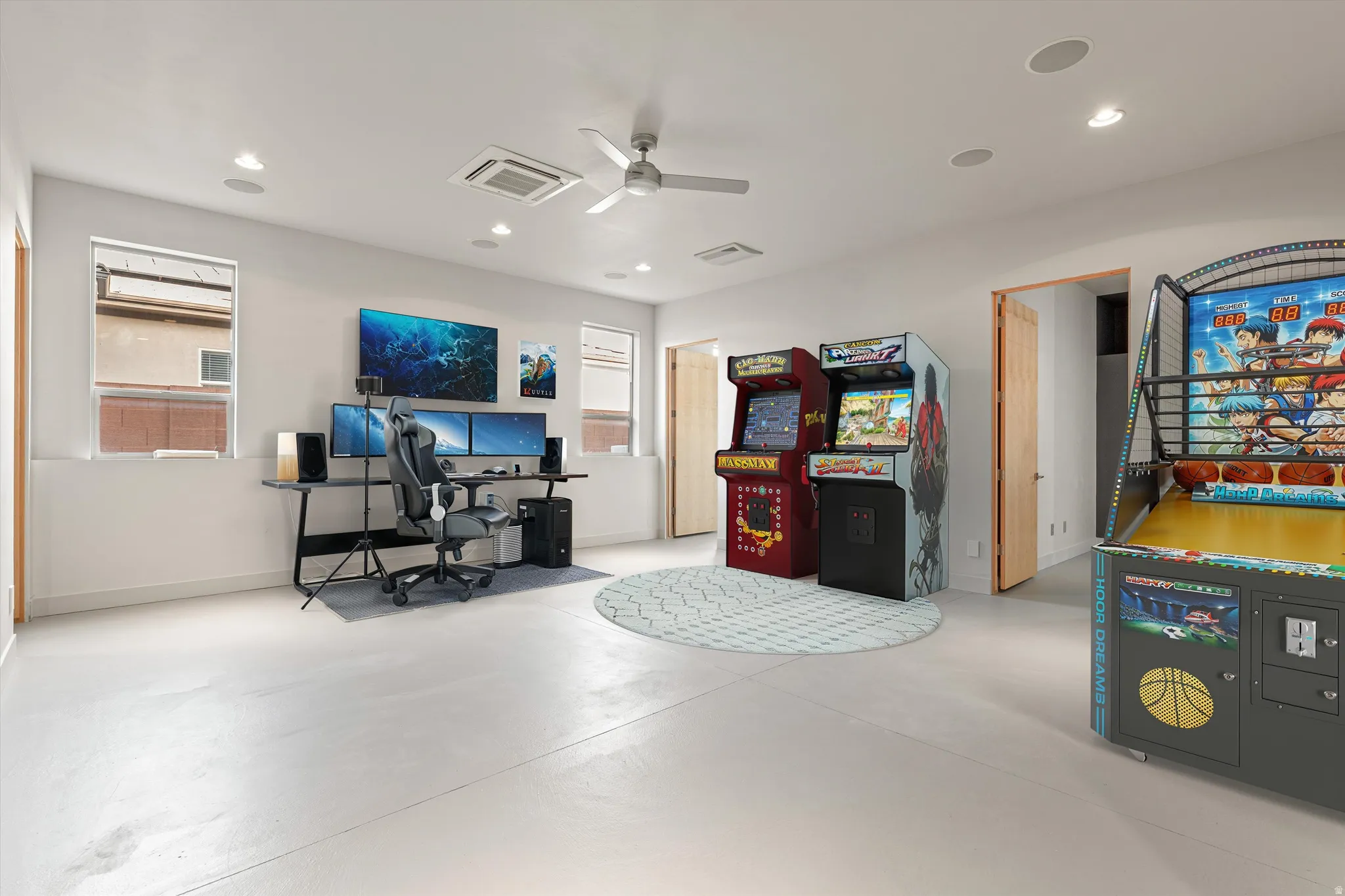 Home office featuring finished concrete floors, a ceiling fan, cooling unit, and recessed lighting
