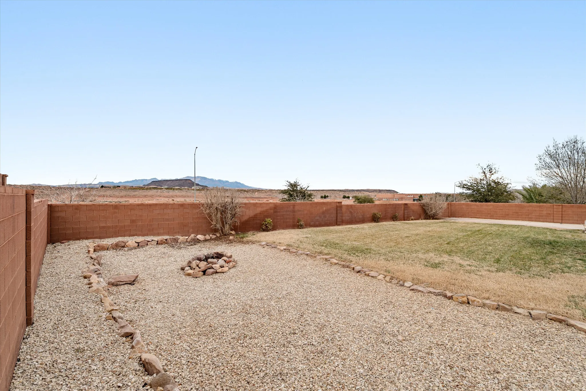 View of fenced backyard
