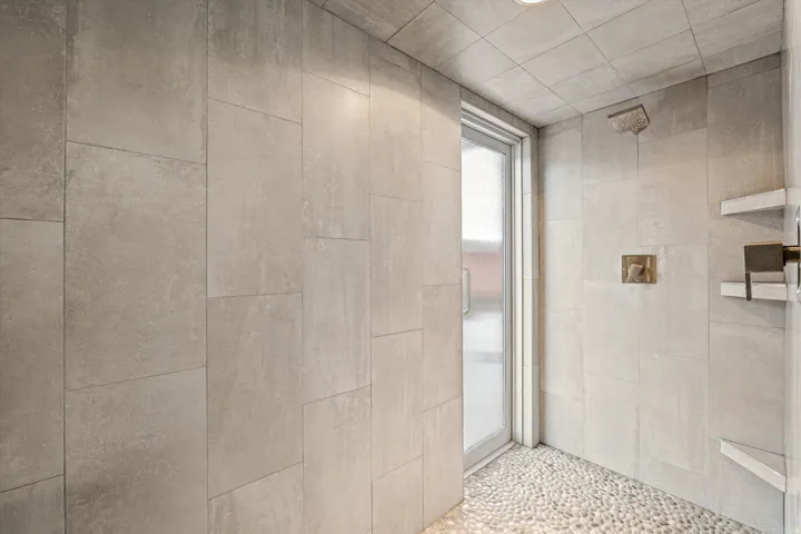 Bathroom with a tile shower