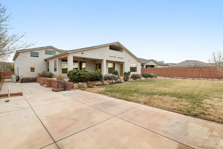 View of front facade featuring stucco siding