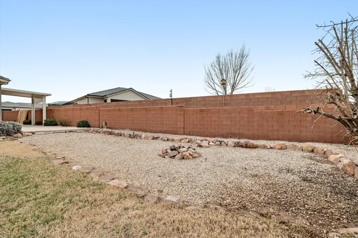 View of fenced backyard