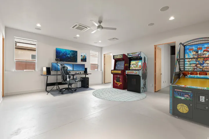 Home office featuring finished concrete floors, a ceiling fan, cooling unit, and recessed lighting