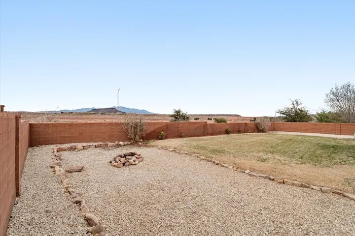 View of fenced backyard