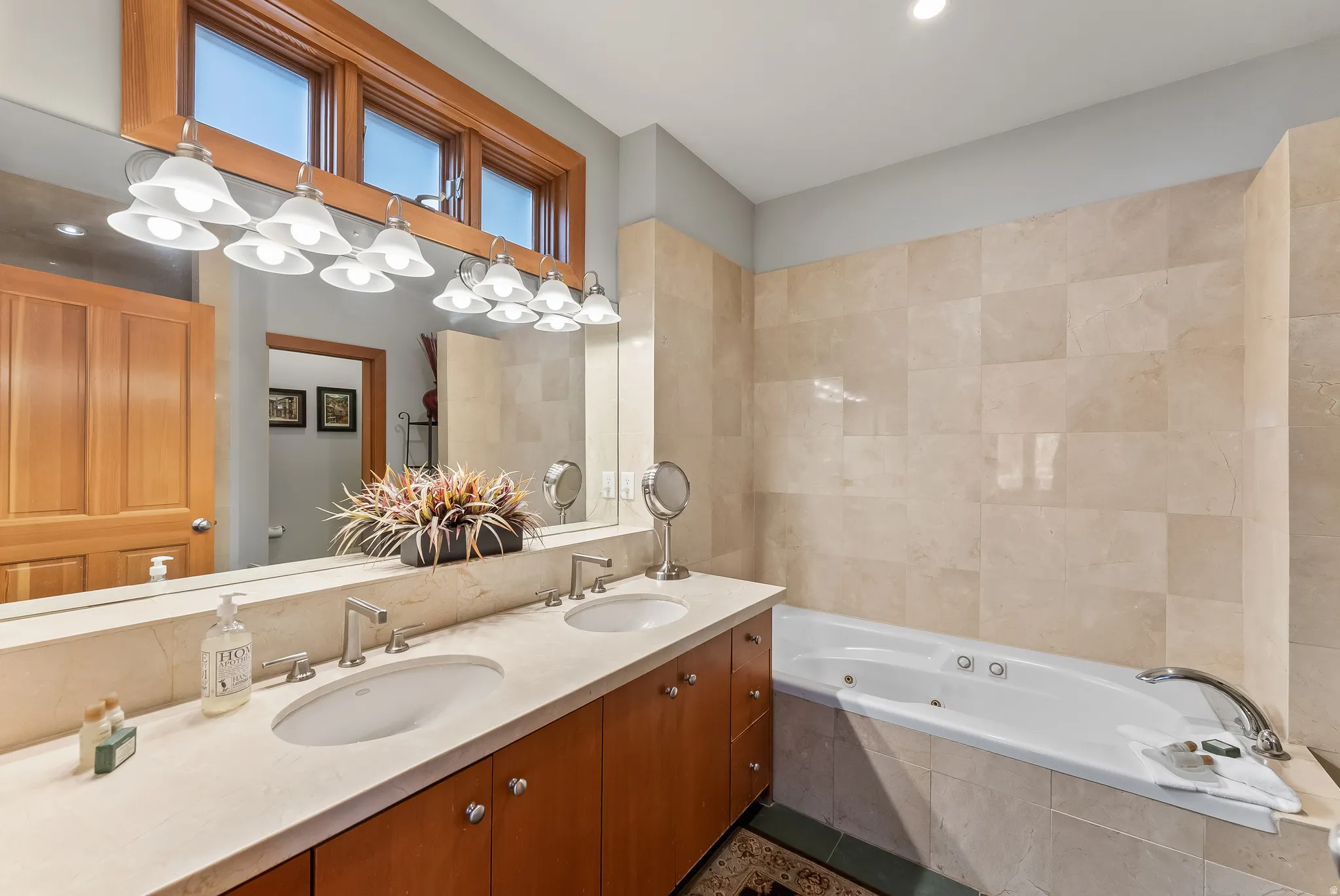 Bathroom with a whirlpool tub and double vanity
