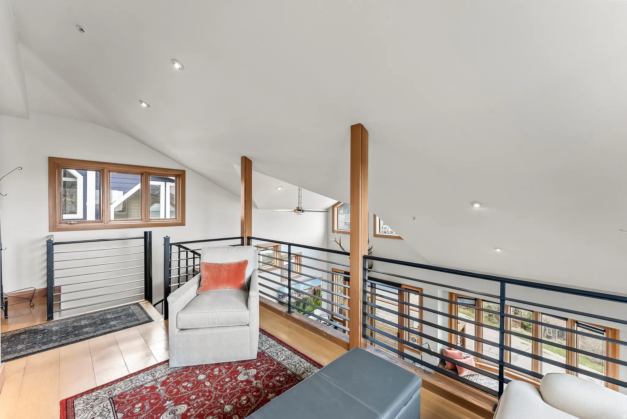 Sitting room featuring ceiling fan, recessed lighting, vaulted ceiling, and light wood-type flooring