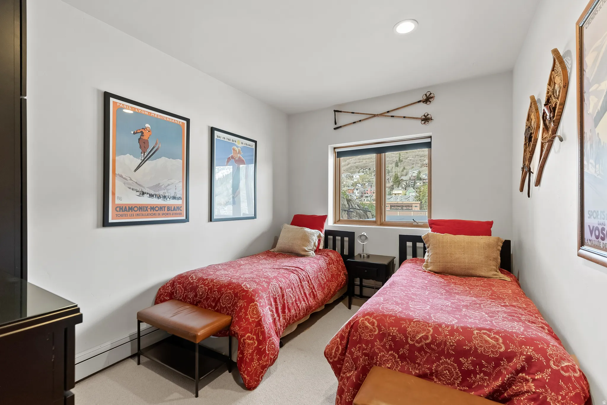Bedroom with a baseboard radiator, carpet, baseboard heating, and recessed lighting
