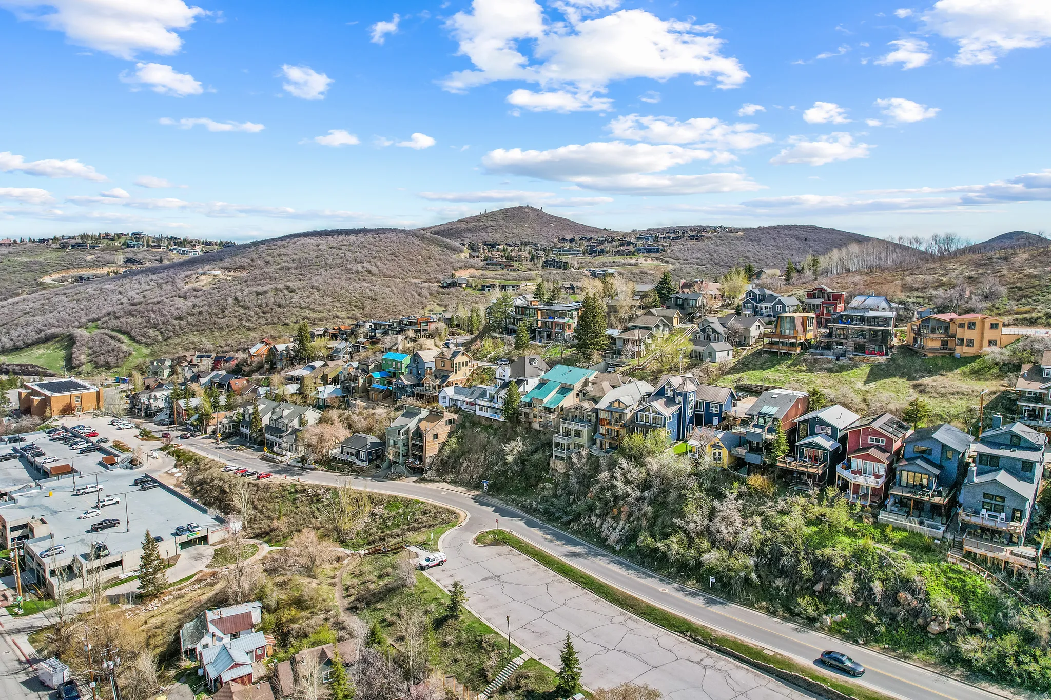 Aerial view of residential area featuring mountains