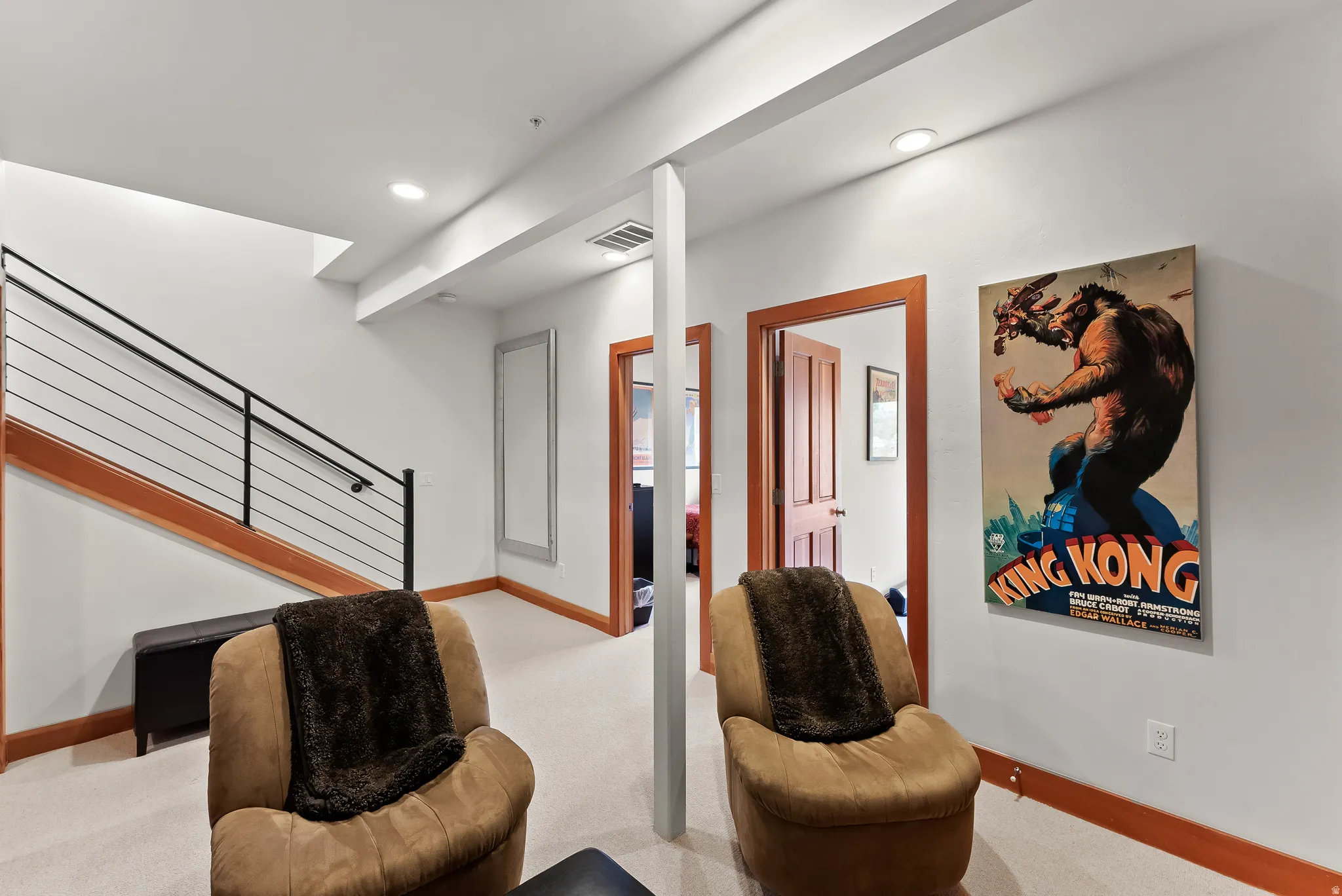 Living area featuring carpet floors and recessed lighting