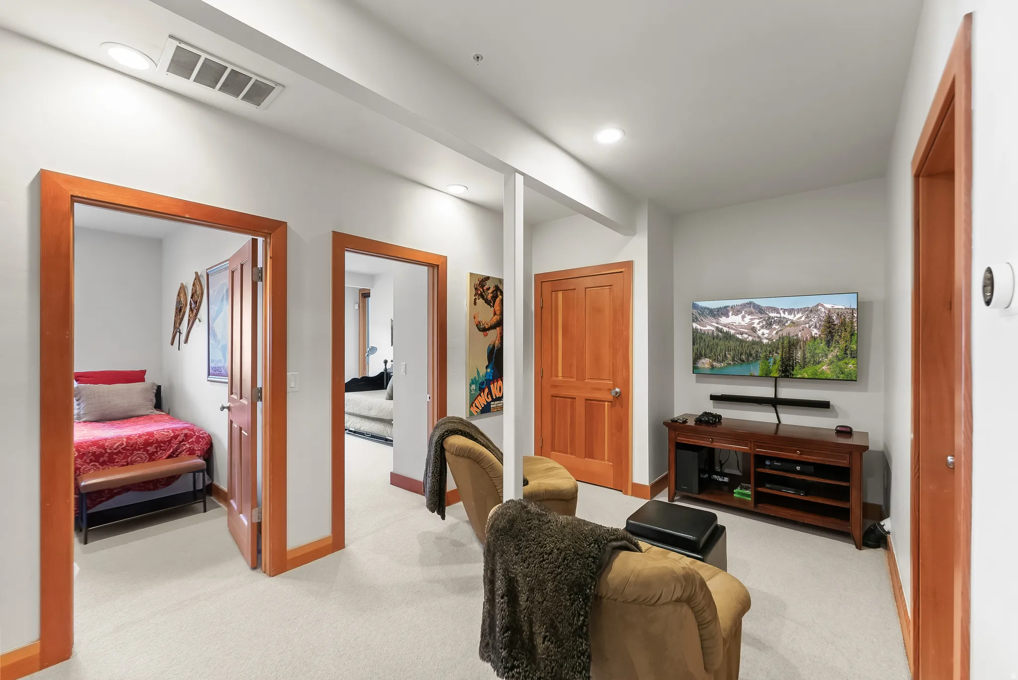 Living area featuring light colored carpet