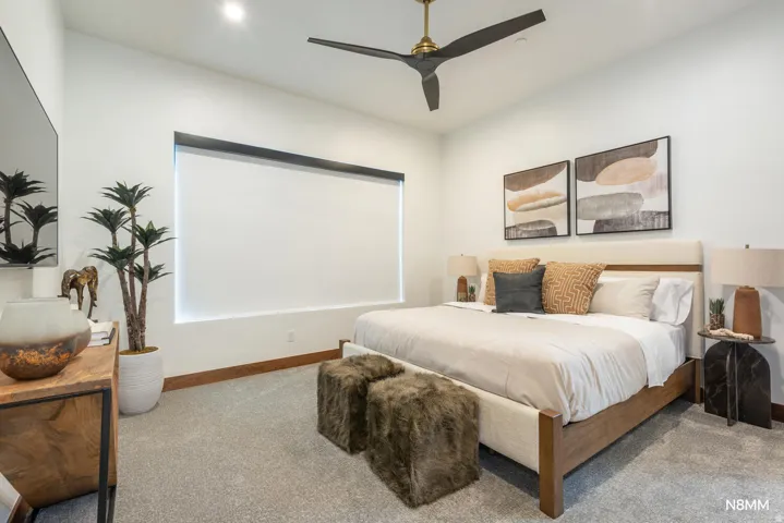 Carpeted guest bedroom