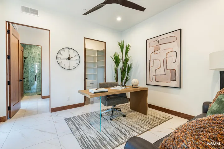 Office featuring ceiling fan, light finish flooring, and recessed lighting