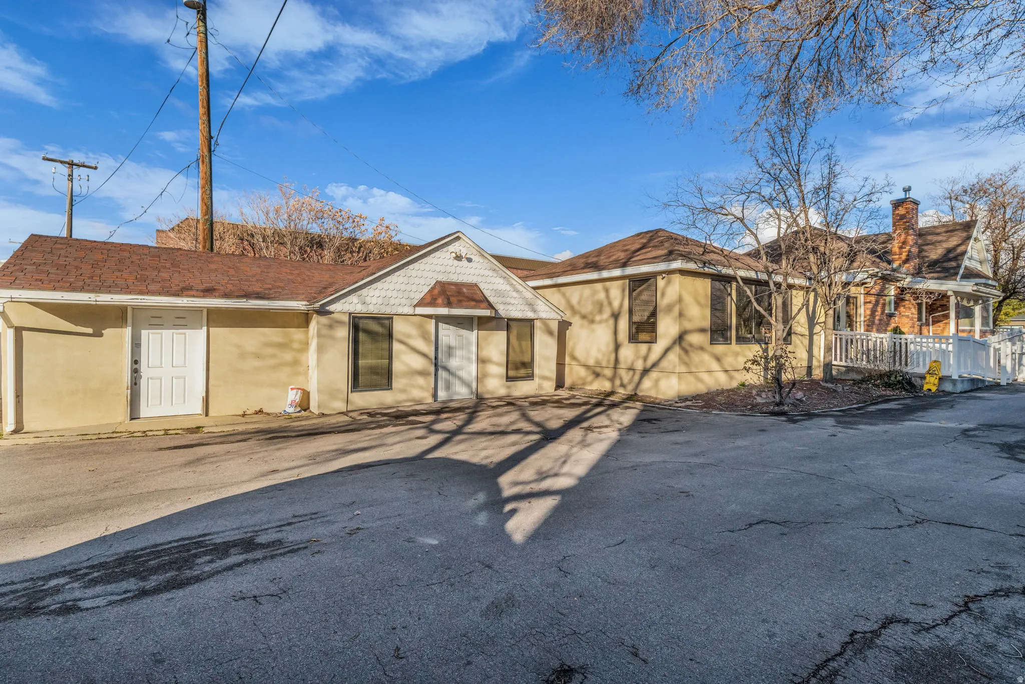 View of front of house featuring a chimney