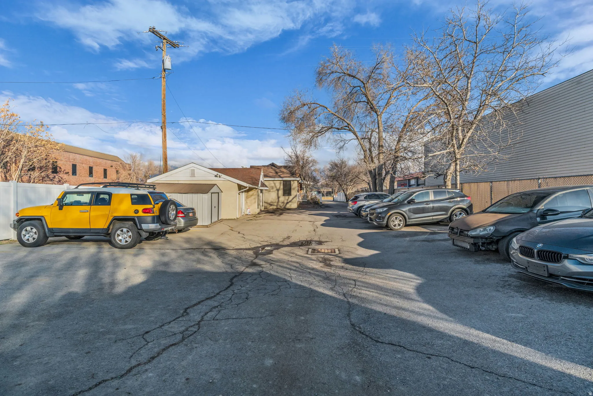 View of asphalt road with a residential view