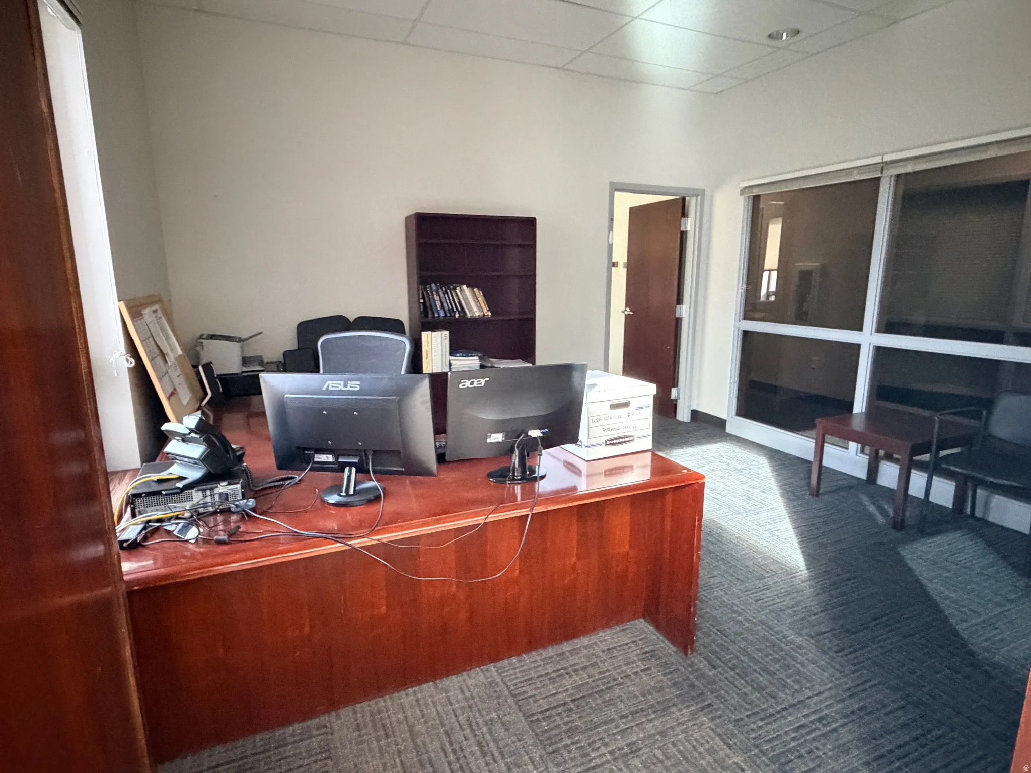 Office space featuring a drop ceiling