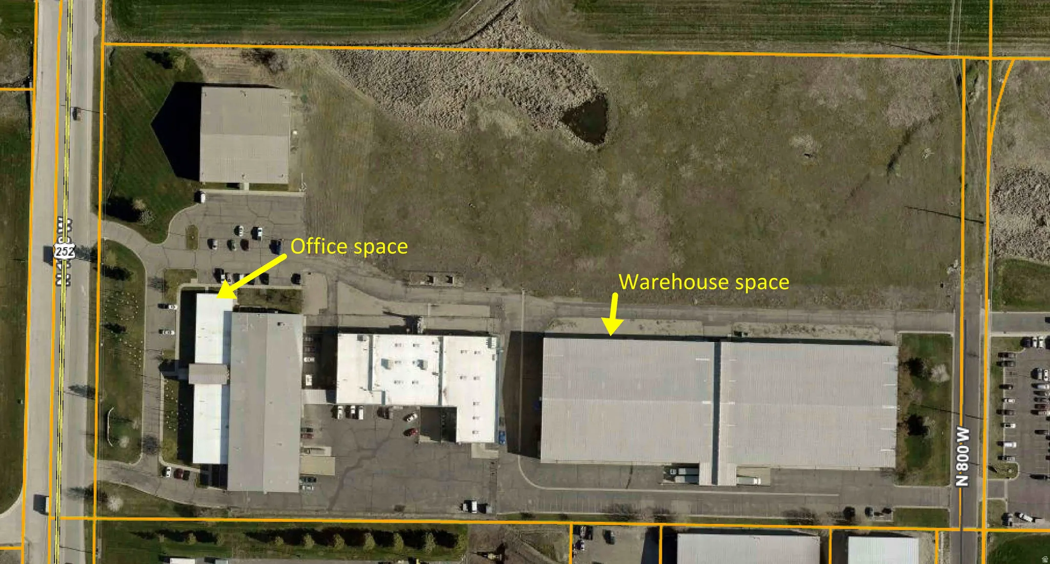 Aerial view of property's location featuring property parcel outlined