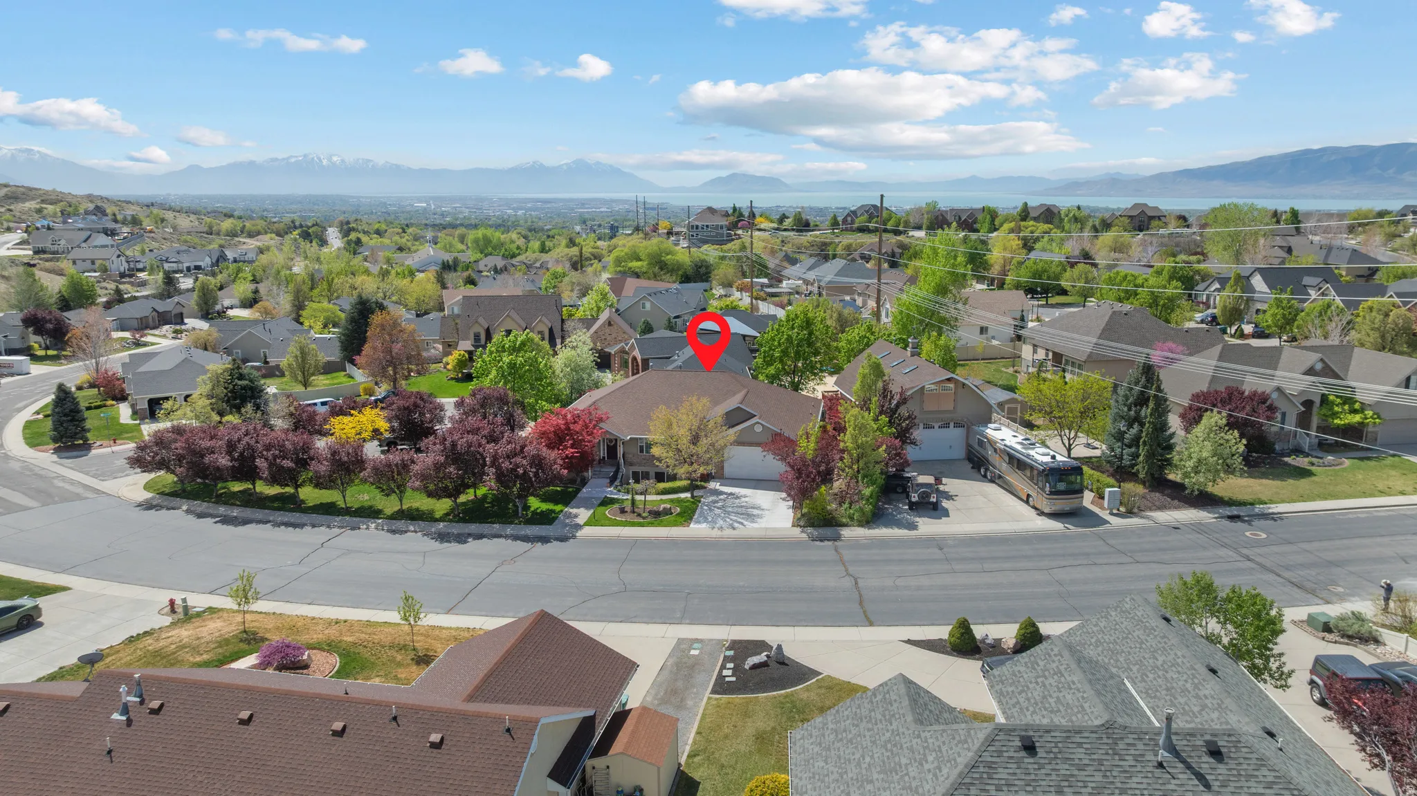 Aerial view of residential area featuring mountains