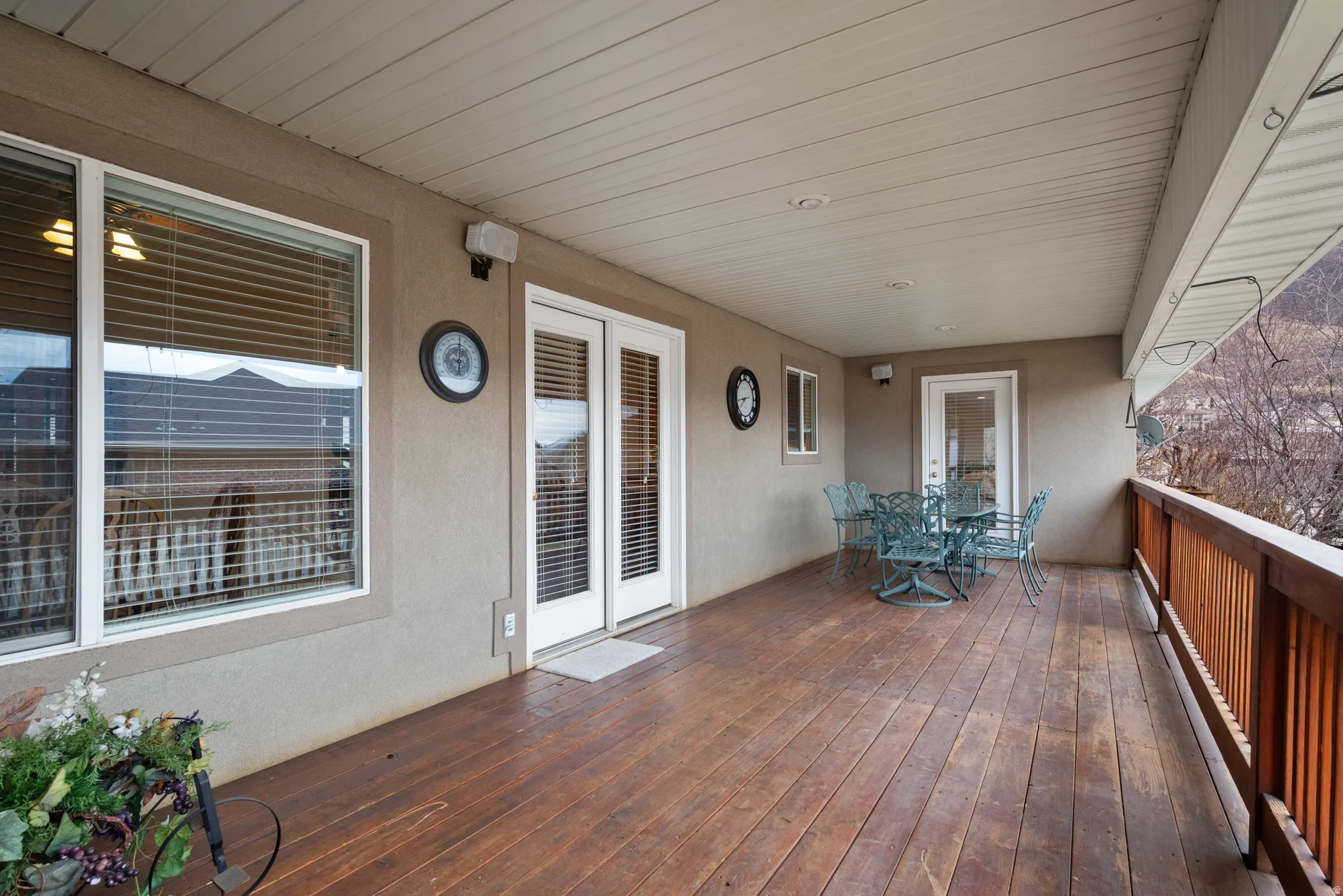 Wooden deck featuring outdoor dining space