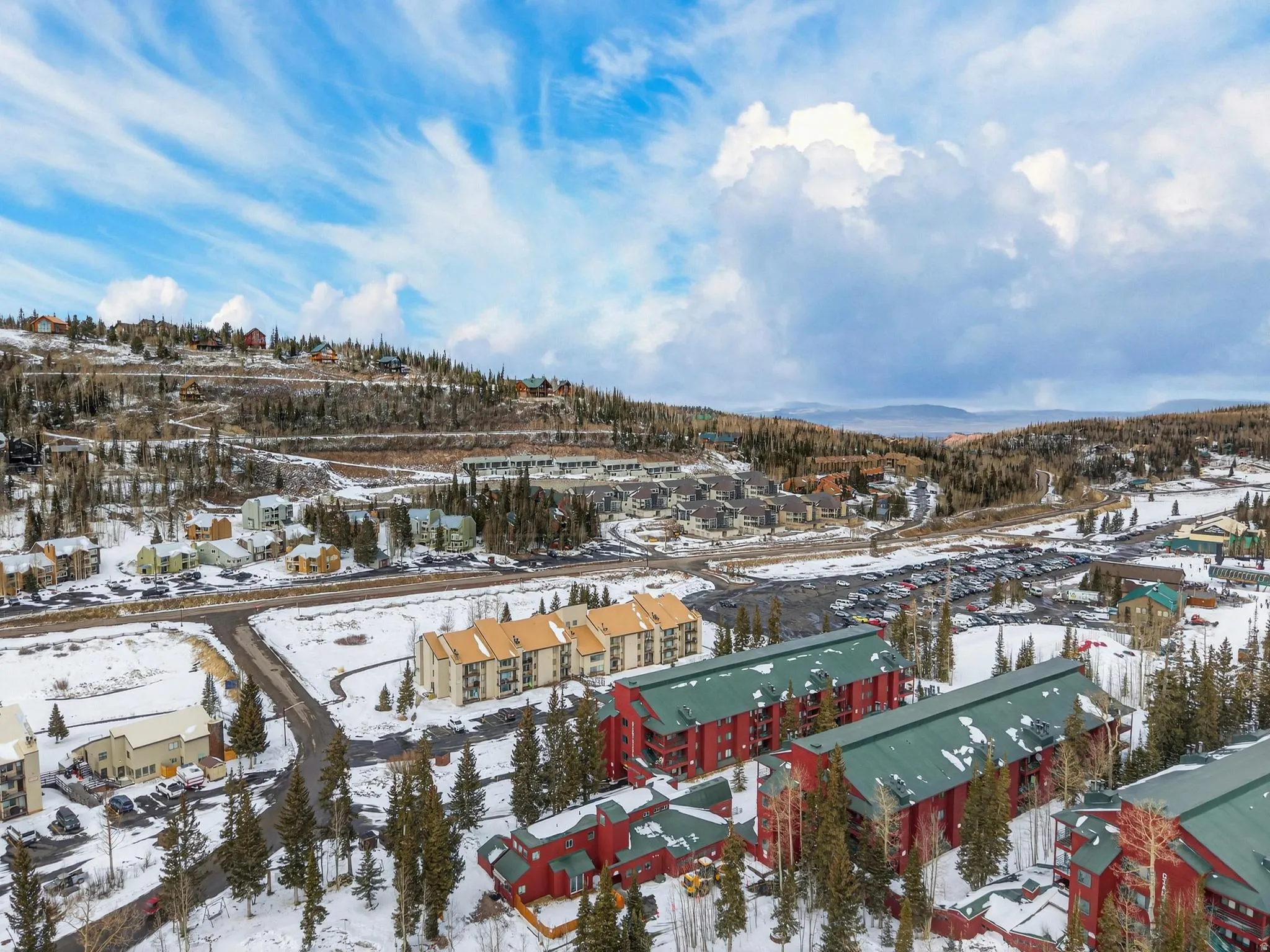 Snowy aerial view with a mountain view