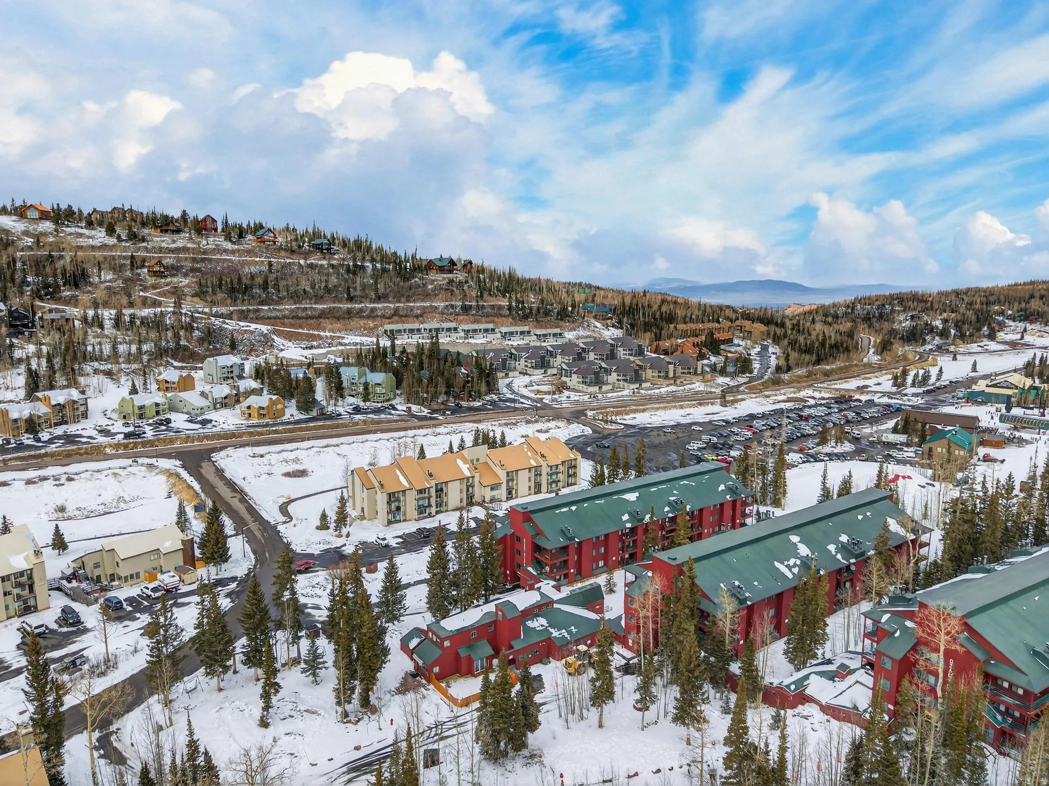 Snowy aerial view with a mountain view