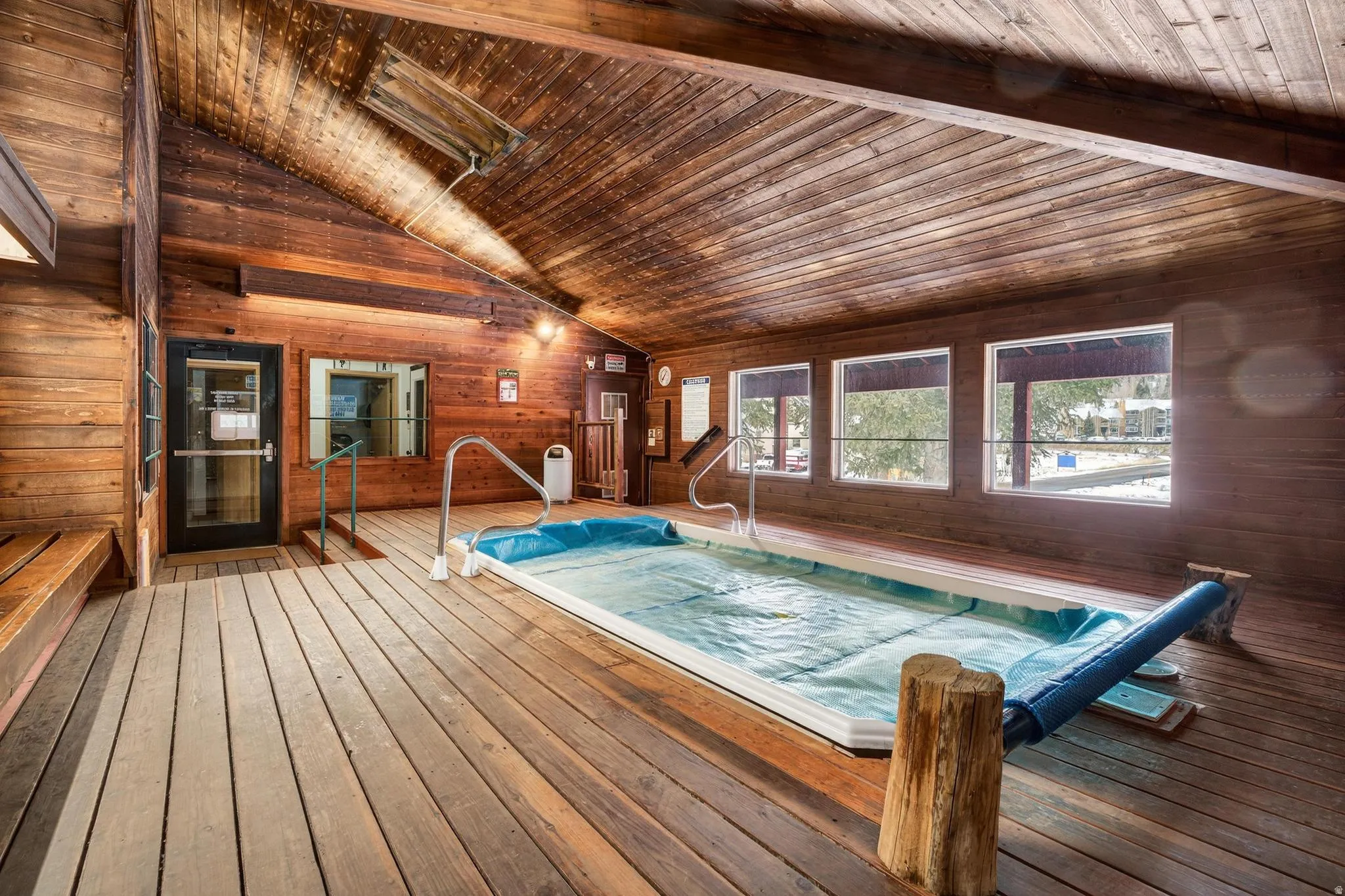 View of pool featuring an indoor hot tub