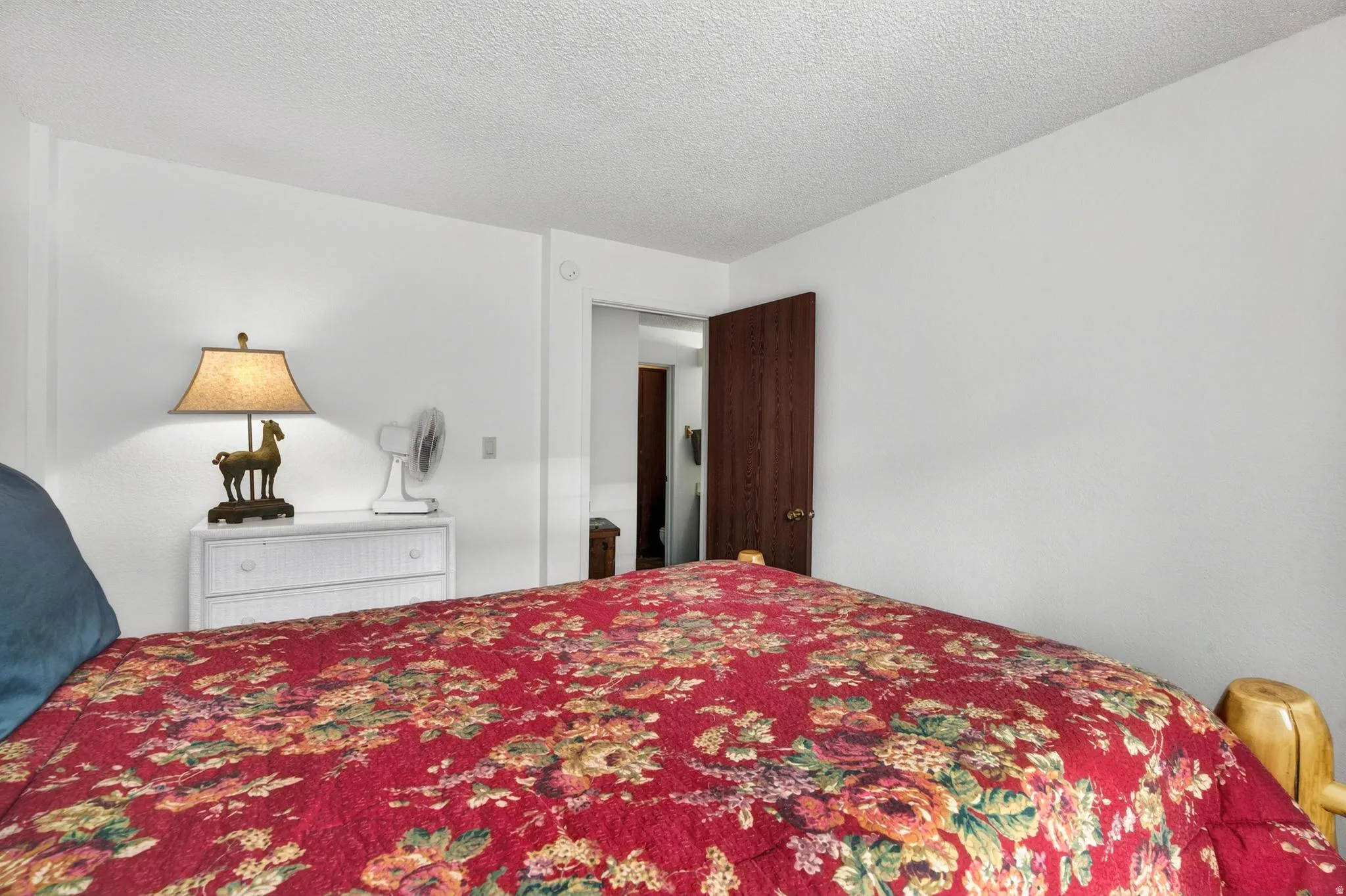 Bedroom featuring a textured ceiling