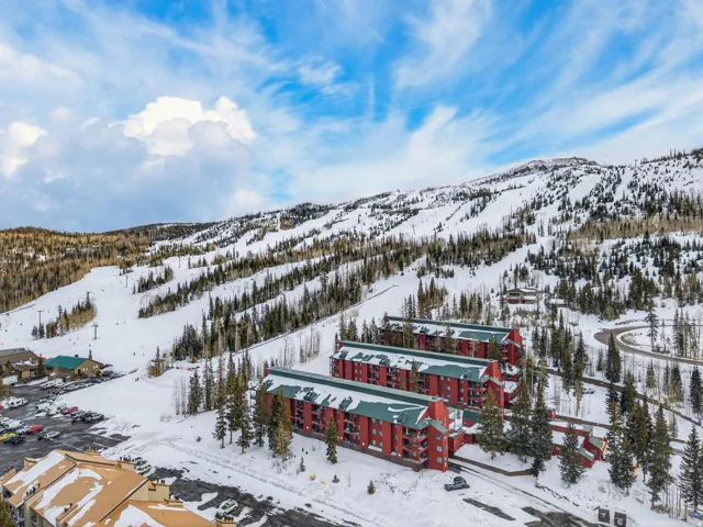 Snowy aerial view with a mountain view