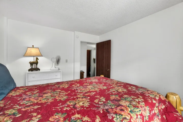 Bedroom featuring a textured ceiling