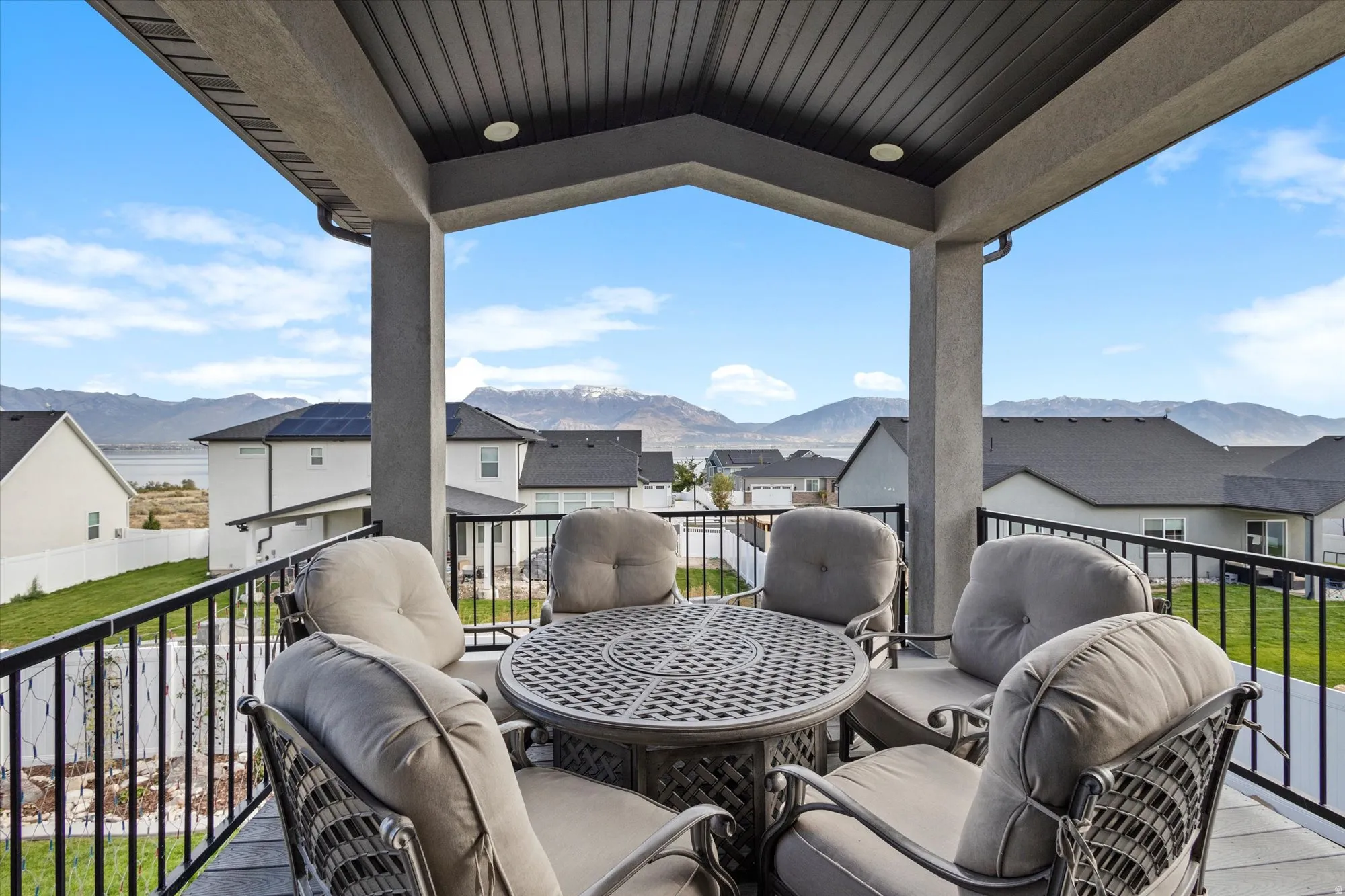 Balcony featuring a mountain view and a residential view