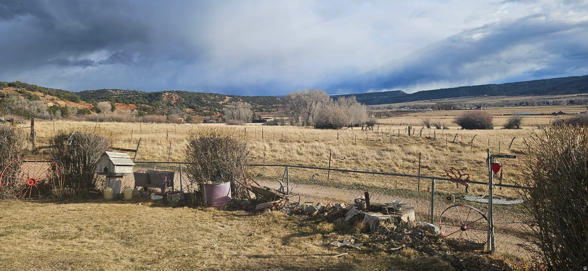 View of mountain backdrop featuring rural landscape