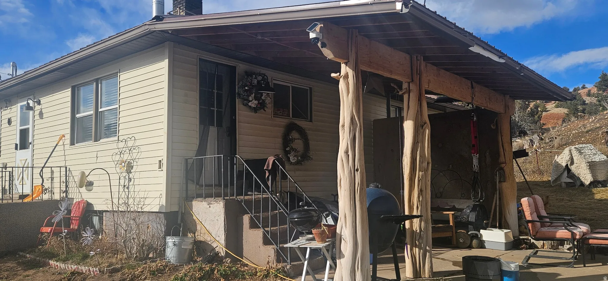 View of property exterior featuring a chimney