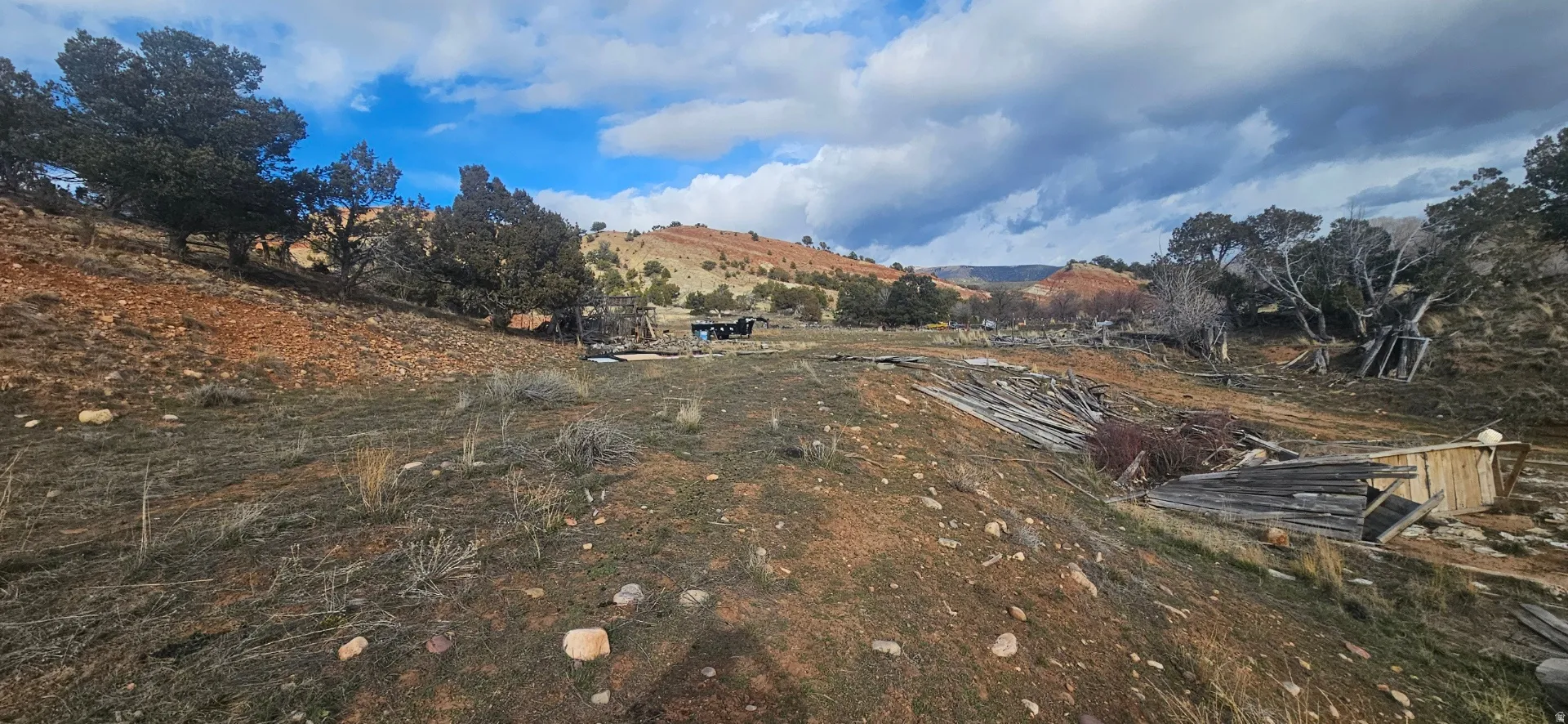 View of yard with a mountain view and a rural view