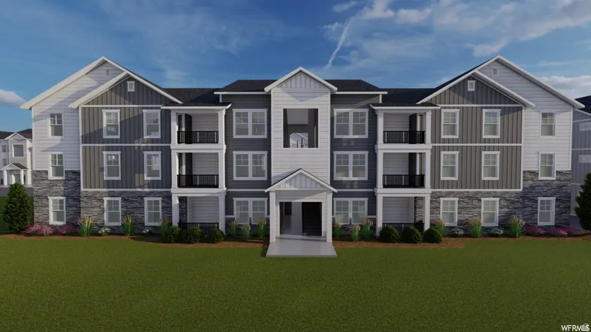 View of front facade featuring stone siding and board and batten siding
