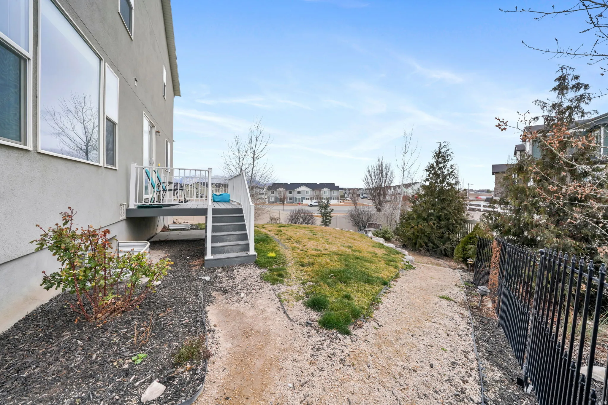 View of fenced backyard