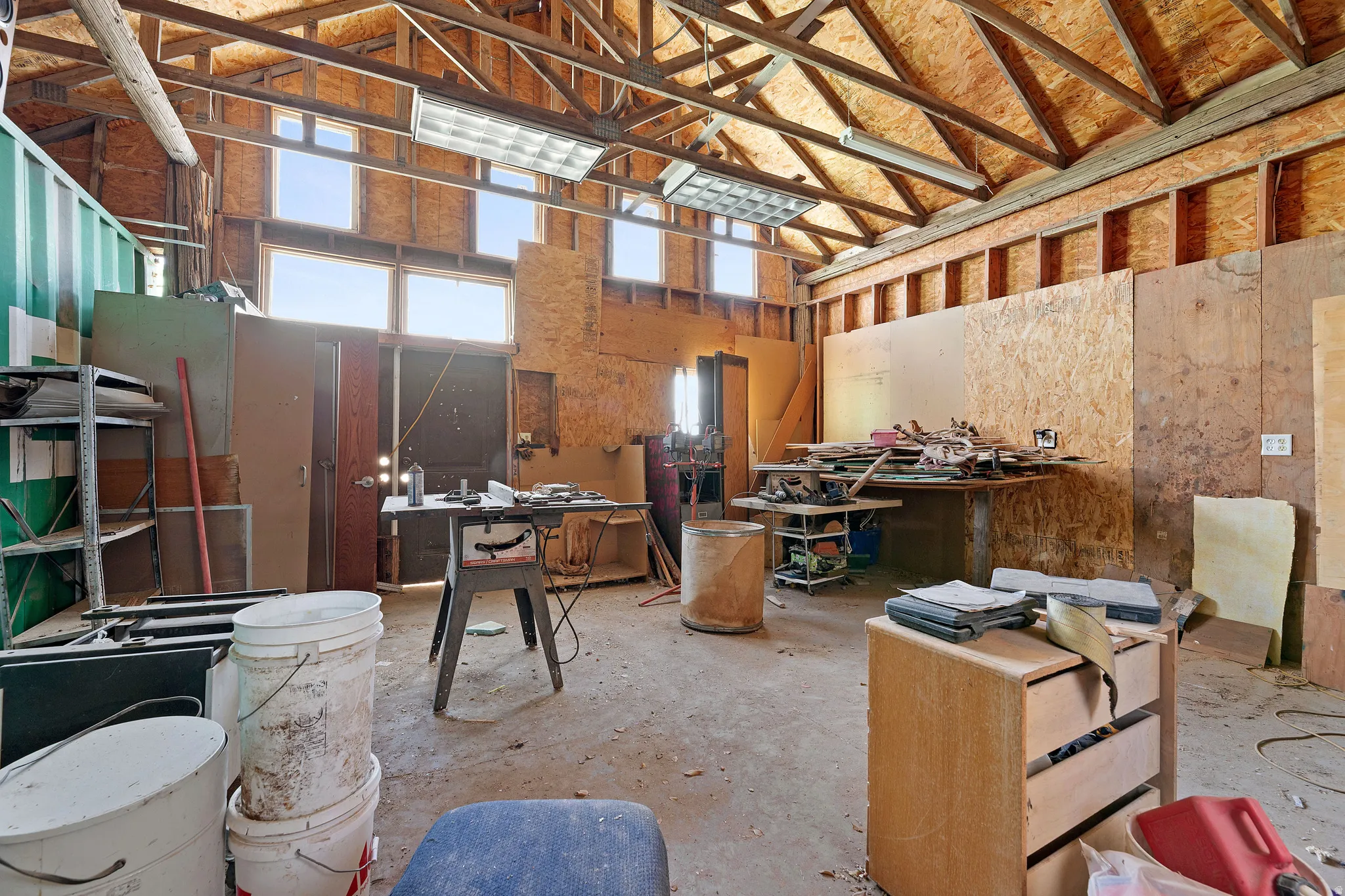 Misc room featuring a high ceiling