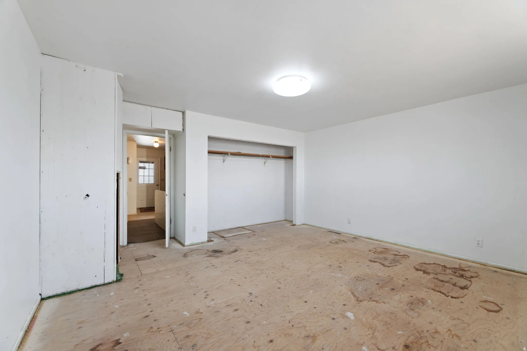 Unfurnished bedroom featuring a closet