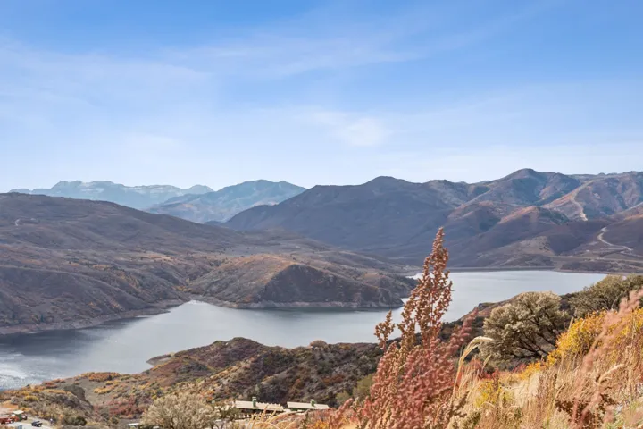 View of mountain backdrop with a large body of water