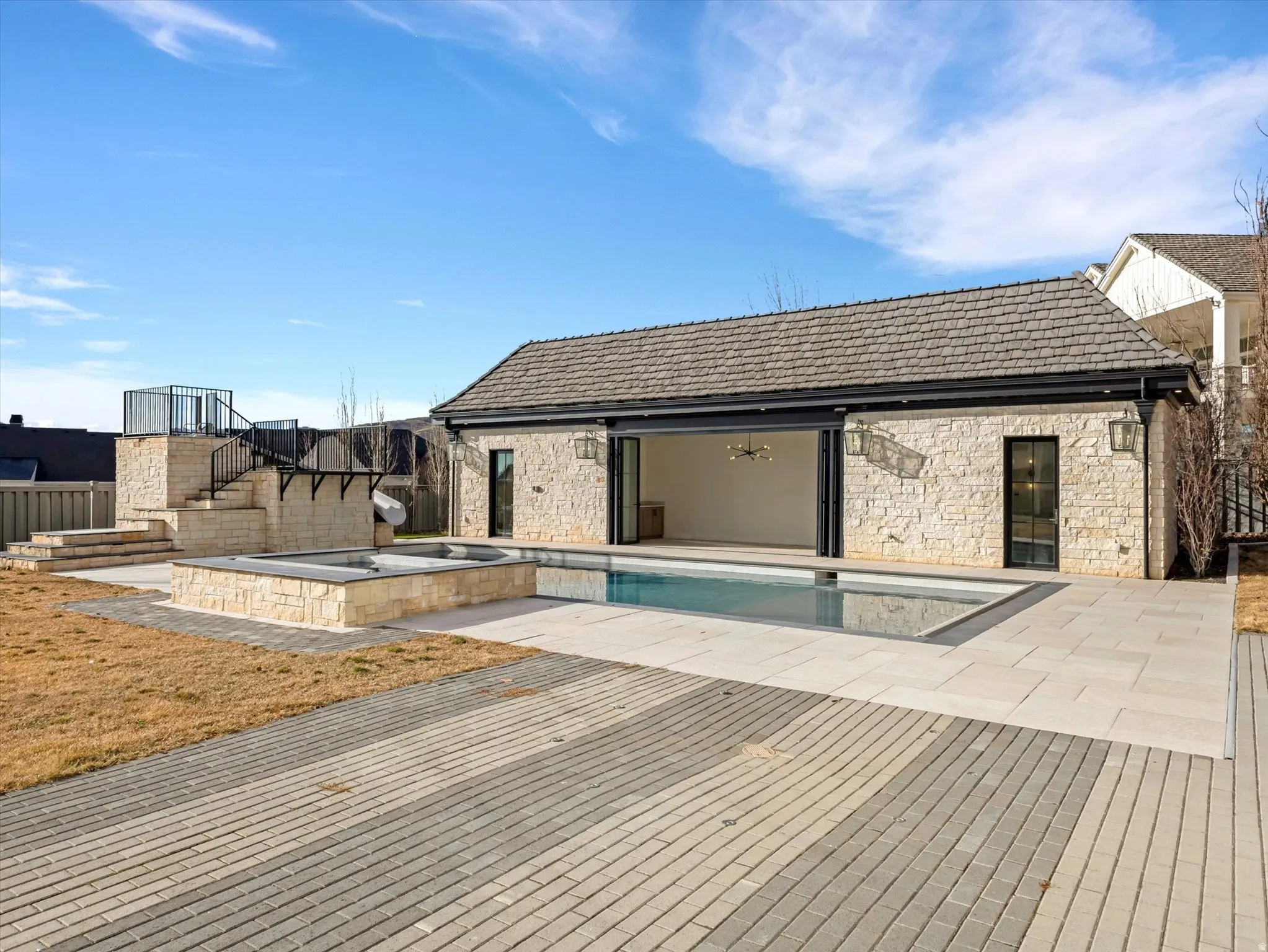 Open air Casita with integrated pool / hot tub with a patio and a wooden deck