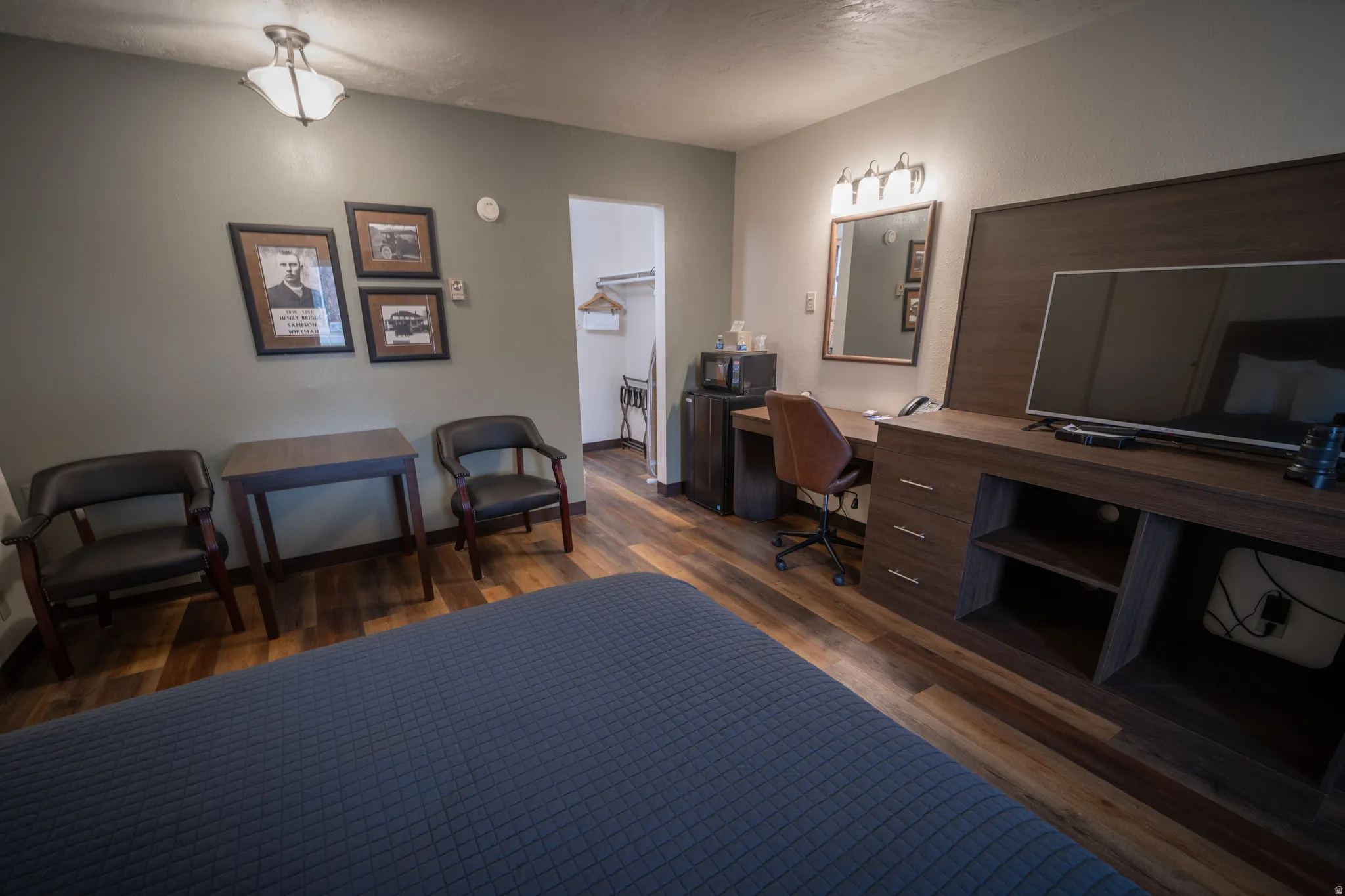 Home office featuring dark wood finished floors