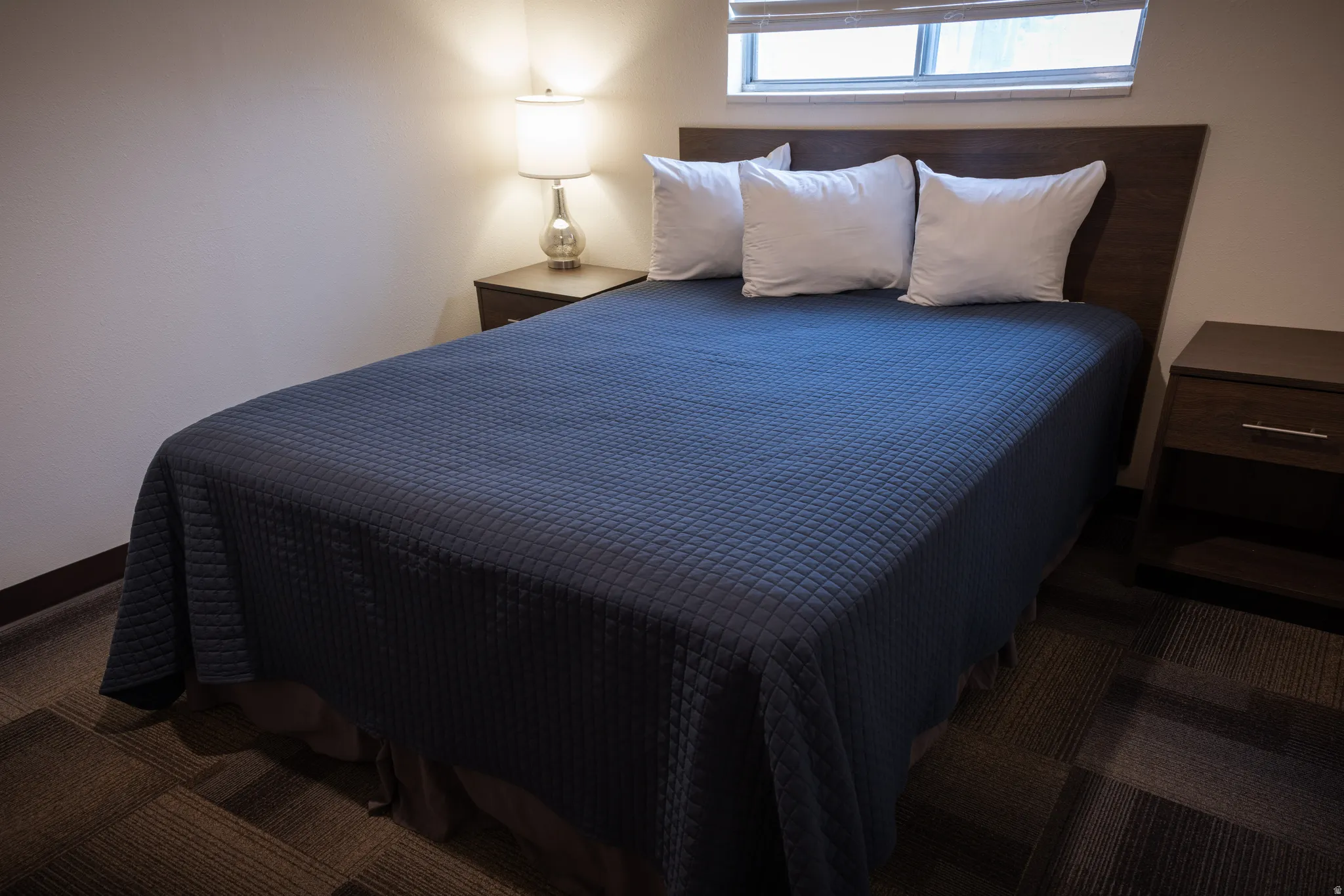Bedroom featuring carpet